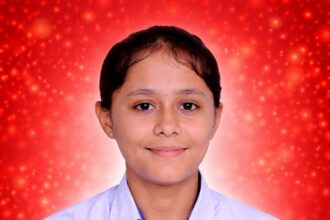 Divya Bhadu RBSE 12th Topper from Barmer scoring 499 out of 500 marks (99.80%)
